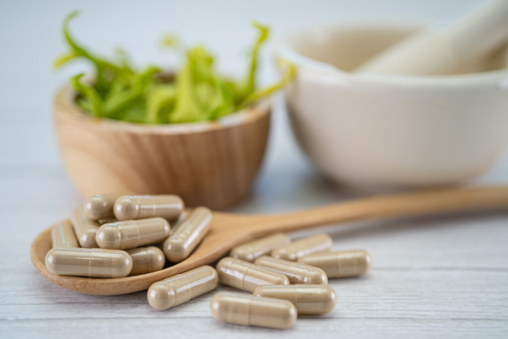 Alternative medicine herbal organic capsule with vitamin E omega